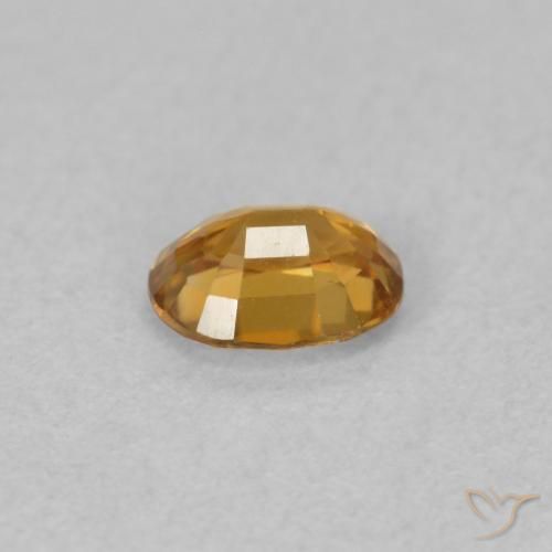 Circón Naranja medio natural de 0.61 ct, Ovalada, VVS