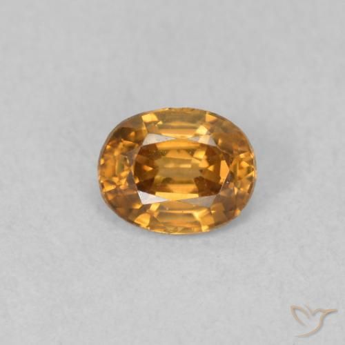 0.66ct Natural Naranja oscuro Circón, Ovalada, VVS