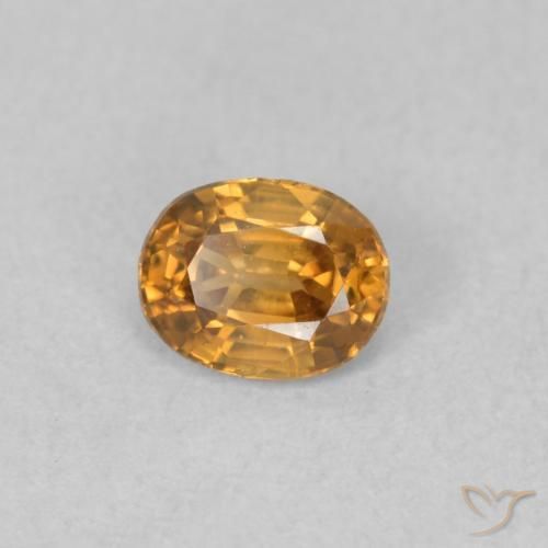 Circón Naranja oscuro natural de 0.66 ct, Ovalada, VVS