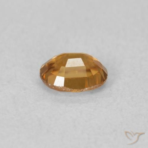 Circón Naranja oscuro natural de 0.66 ct, Ovalada, VVS