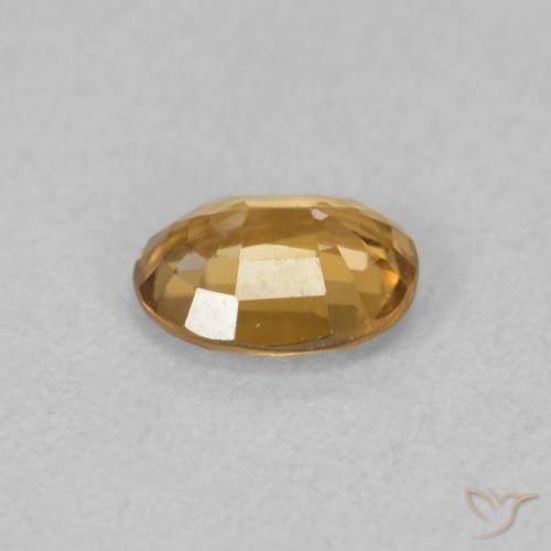 Circón Dorado medio natural de 0.87 ct, Ovalada, VVS