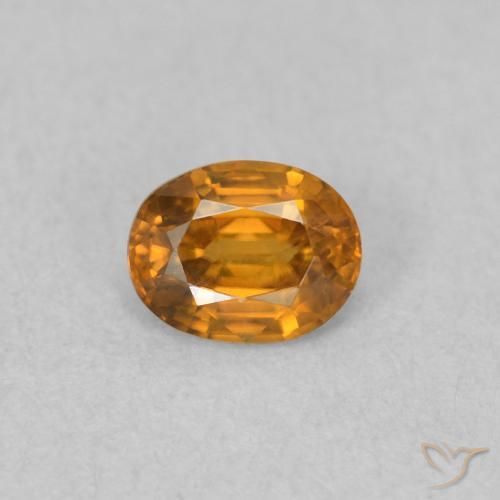 0.59ct Natural Naranja marrón Circón, Ovalada, VVS-VS