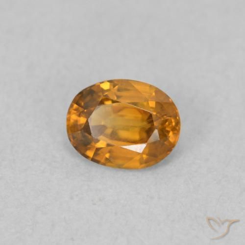 Circón Naranja marrón natural de 0.59 ct, Ovalada, VVS-VS