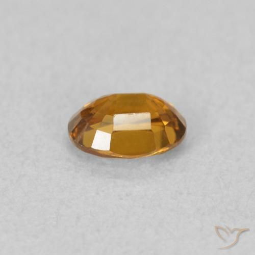 Circón Naranja marrón natural de 0.59 ct, Ovalada, VVS-VS