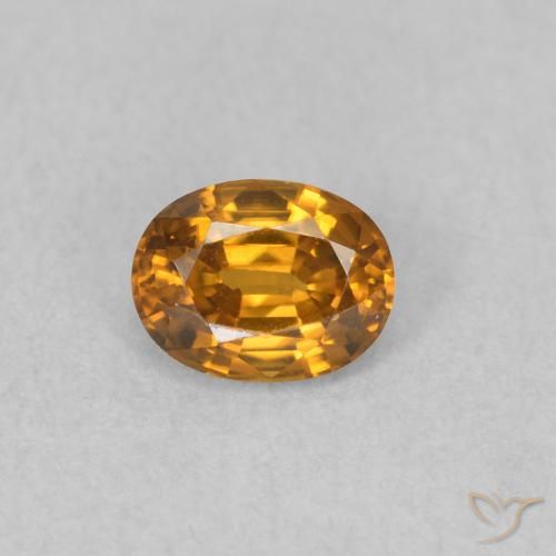 0.63ct Natural Naranja marrón Circón, Ovalada, VVS-VS