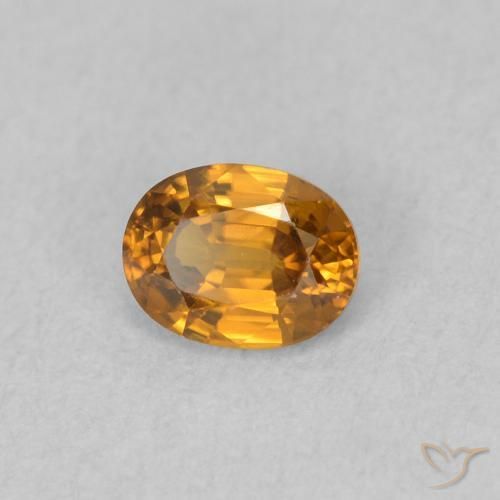 Circón Naranja marrón natural de 0.63 ct, Ovalada, VVS-VS