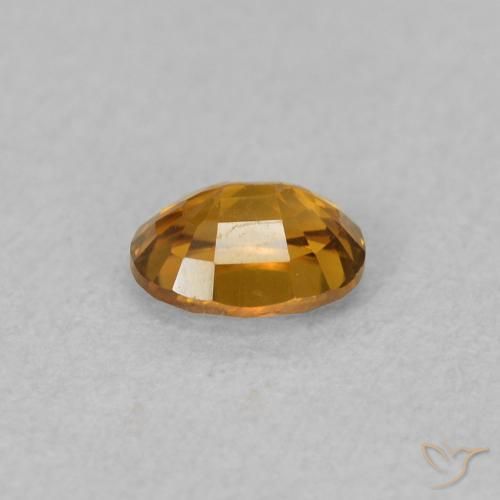 Circón Naranja marrón natural de 0.63 ct, Ovalada, VVS-VS