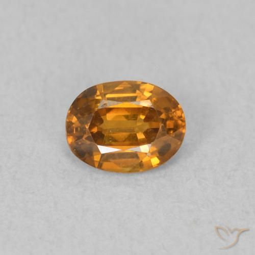 0.58ct Natural Naranja marrón Circón, Ovalada, VVS-VS