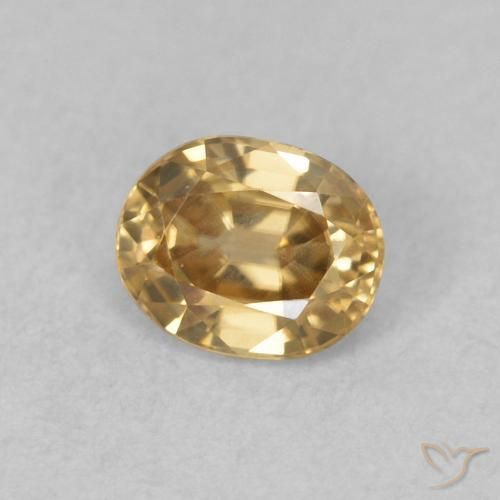 Circón champaña natural de 0.60 ct, Ovalada, VVS