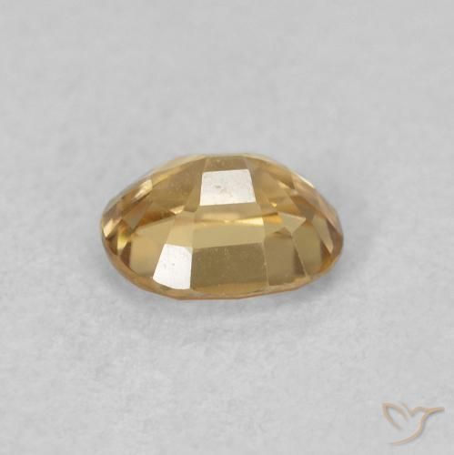 Circón champaña natural de 0.60 ct, Ovalada, VVS