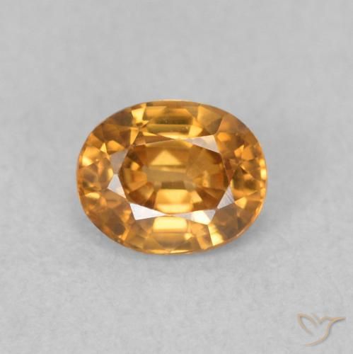 0.62ct Natural Naranja oscuro Circón, Ovalada, VVS