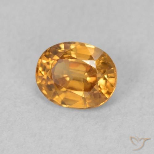 Circón Naranja oscuro natural de 0.62 ct, Ovalada, VVS