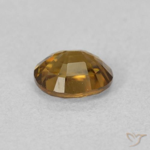 Circón Marrón-oro natural de 0.62 ct, Ovalada, VVS
