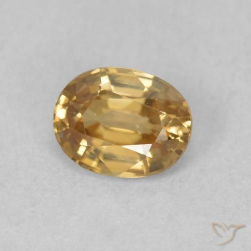 Circón champaña natural de 0.63 ct, Ovalada, VVS