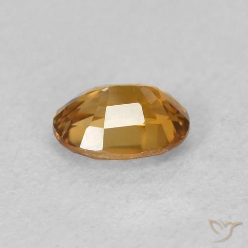 Circón Marrón-oro natural de 0.62 ct, Ovalada, VVS