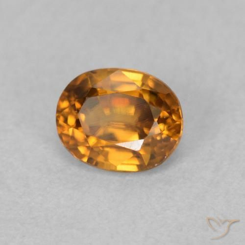 Circón Marrón naranja natural de 0.64 ct, Ovalada, VVS