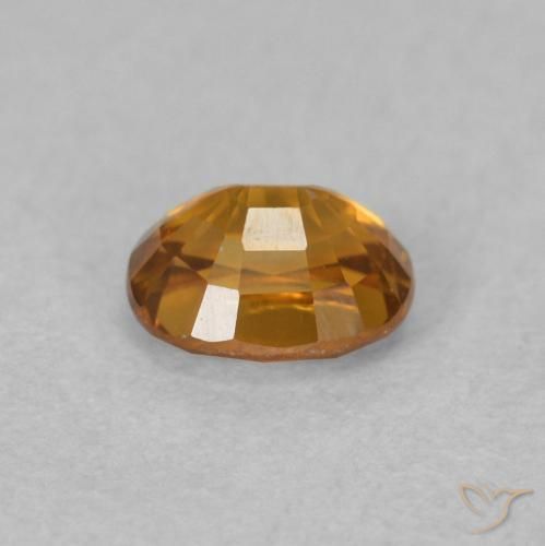 Circón Marrón naranja natural de 0.64 ct, Ovalada, VVS