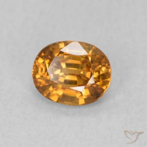 Circón Marrón naranja natural de 0.67 ct, Ovalada, VS