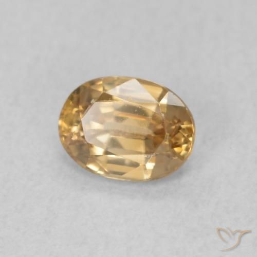 Circón Durazno dorado natural de 0.57 ct, Ovalada, VS