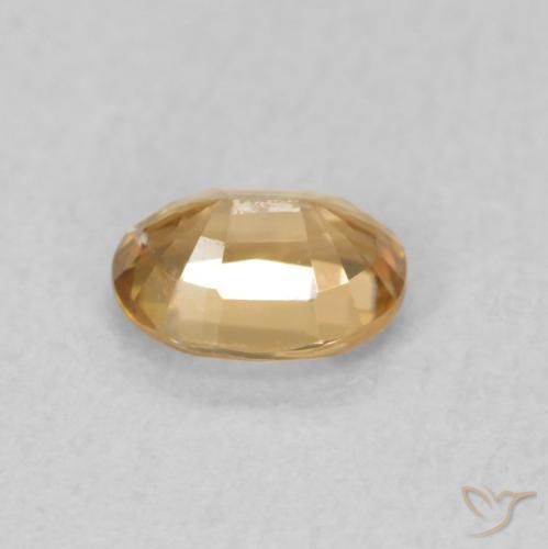 Circón Durazno dorado natural de 0.57 ct, Ovalada, VS