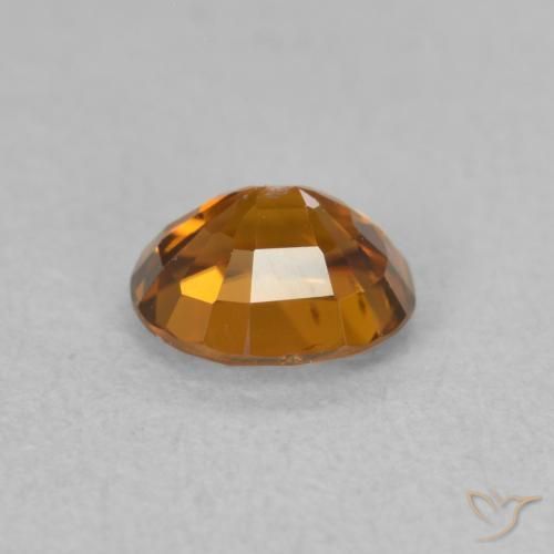 Circón Medium Dark-Orange natural de 0.99 ct, Ovalada, VVS-VS