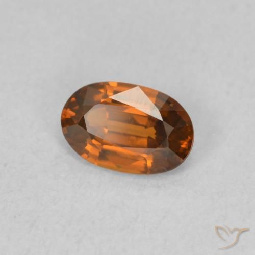 Circón Naranja rojizo natural de 0.64 ct, Ovalada, VVS