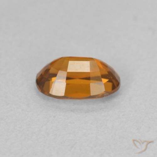 Circón Naranja medio natural de 0.80 ct, Ovalada, VVS