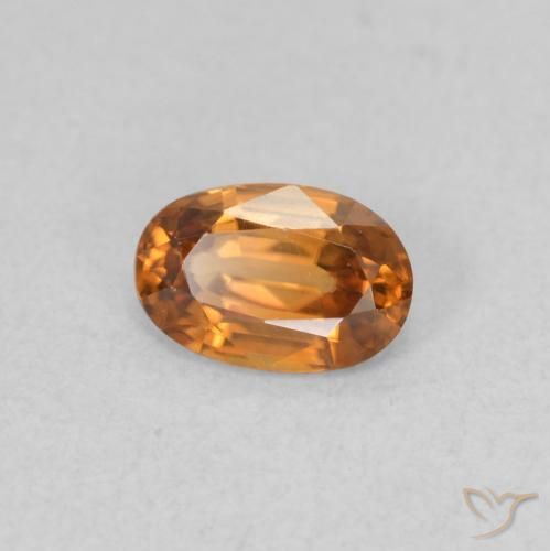 Circón Marrón naranja natural de 0.64 ct, Ovalada, VVS