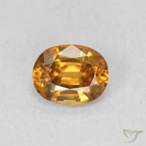 0.65ct Natural Naranja marrón Circón, Ovalada, VVS-VS