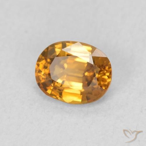 Circón Naranja marrón natural de 0.65 ct, Ovalada, VVS-VS