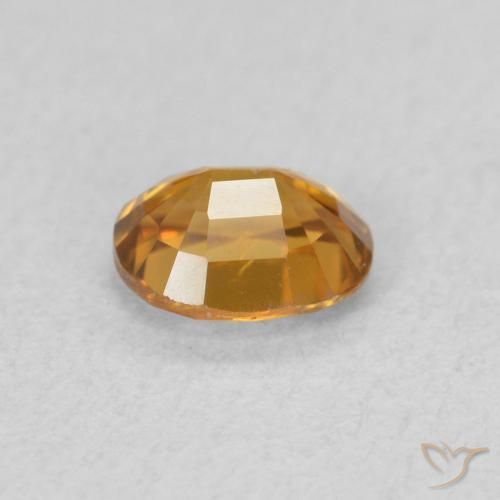 Circón Naranja marrón natural de 0.65 ct, Ovalada, VVS-VS