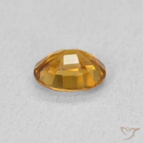 Circón Dorado oscuro natural de 0.57 ct, Ovalada, VVS