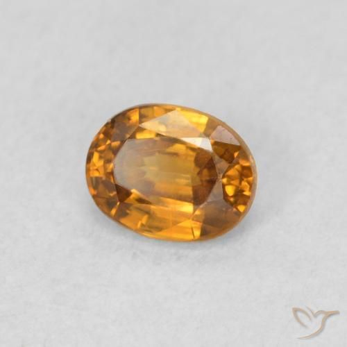 Circón Naranja terroso natural de 0.60 ct, Ovalada, VS