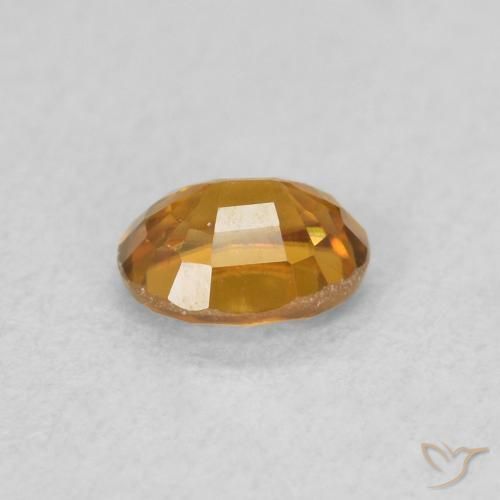 Circón Naranja terroso natural de 0.60 ct, Ovalada, VS