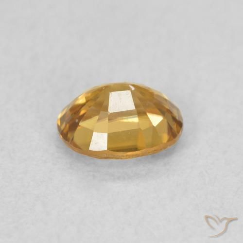 Circón Dorado marrón natural de 0.65 ct, Ovalada, VS