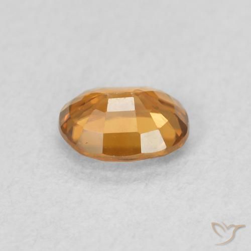 Circón Naranja medio natural de 0.61 ct, Ovalada, VVS-VS