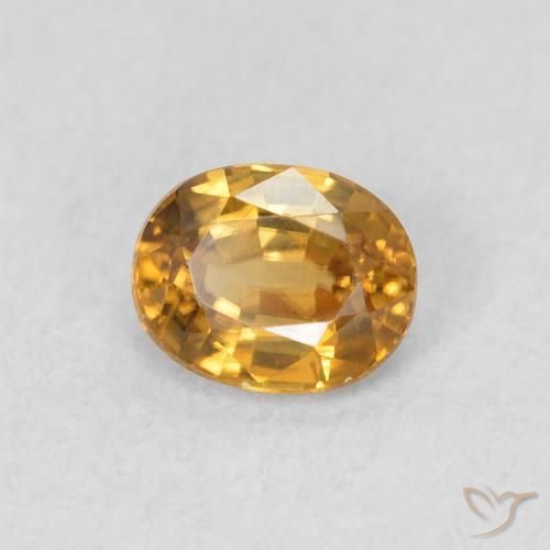 Circón Dorado marrón natural de 0.64 ct, Ovalada, VVS-VS