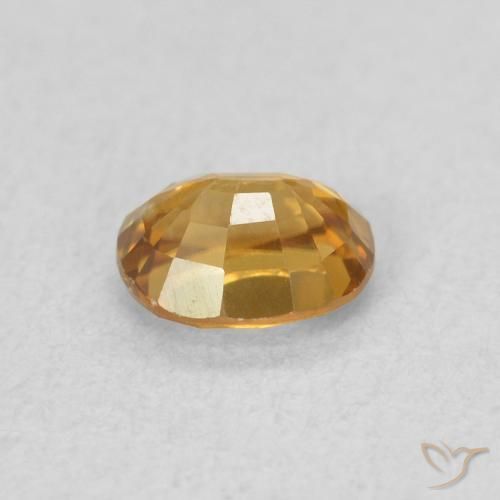 Circón Dorado marrón natural de 0.64 ct, Ovalada, VVS-VS