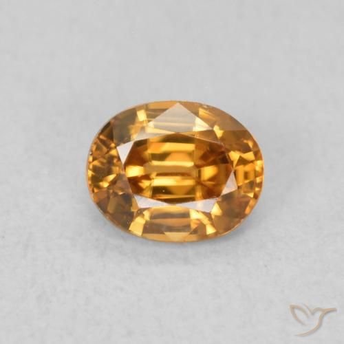 0.62ct Natural Naranja medio Circón, Ovalada, VVS