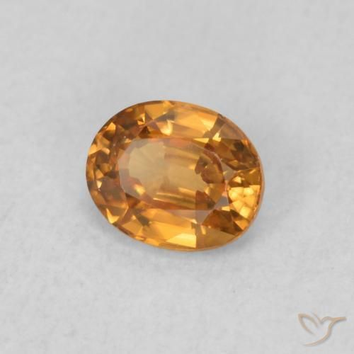 Circón Naranja medio natural de 0.61 ct, Ovalada, VVS