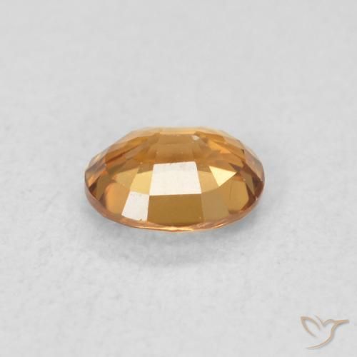 Circón Naranja medio natural de 0.61 ct, Ovalada, VVS