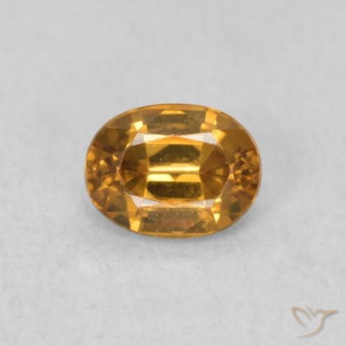 0.62ct Natural Naranja medio Circón, Ovalada, VVS