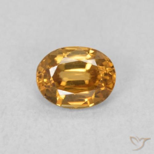0.61ct Natural Naranja medio Circón, Ovalada, VVS