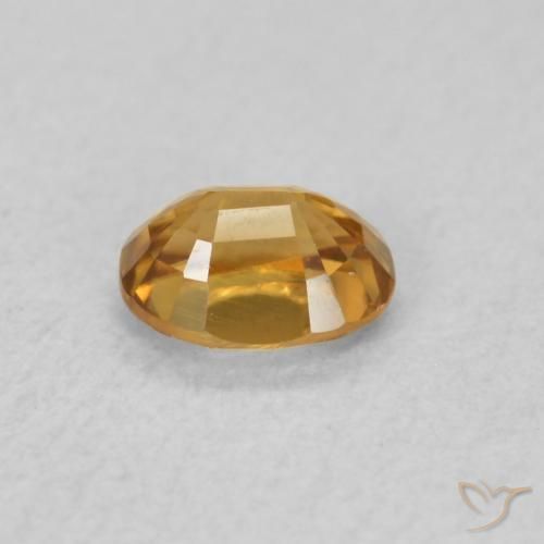 Circón Naranja medio natural de 0.61 ct, Ovalada, VVS