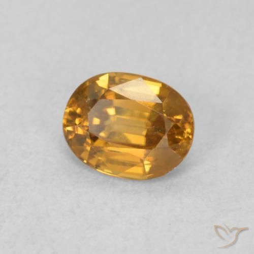Circón Marrón naranja natural de 0.63 ct, Ovalada, VVS
