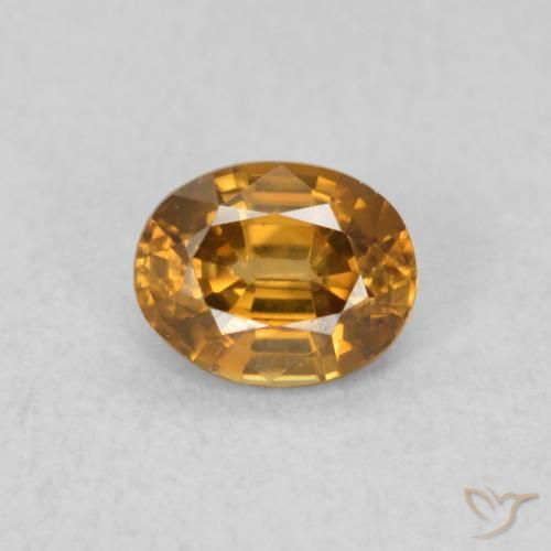 0.60ct Natural Marrón naranja Circón, Ovalada, VVS