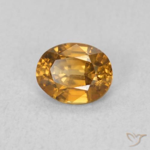 Circón Marrón naranja natural de 0.60 ct, Ovalada, VVS