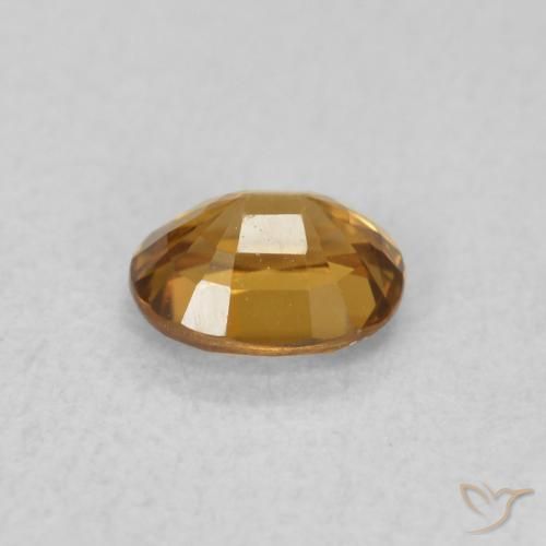 Circón Marrón naranja natural de 0.60 ct, Ovalada, VVS