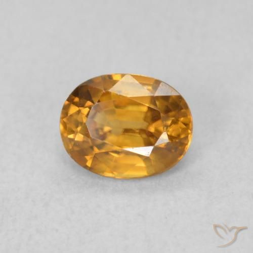 Circón Marrón naranja natural de 0.62 ct, Ovalada, VVS-VS