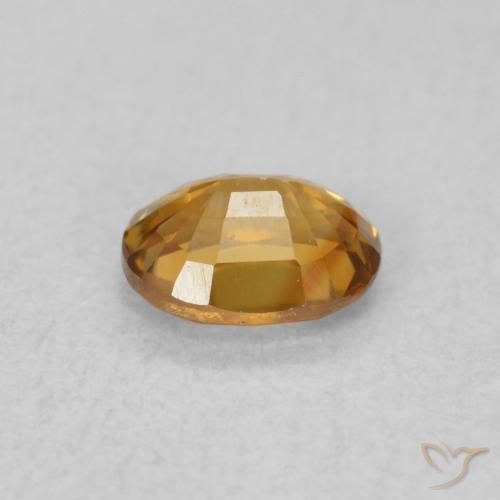 Circón Marrón naranja natural de 0.62 ct, Ovalada, VVS-VS